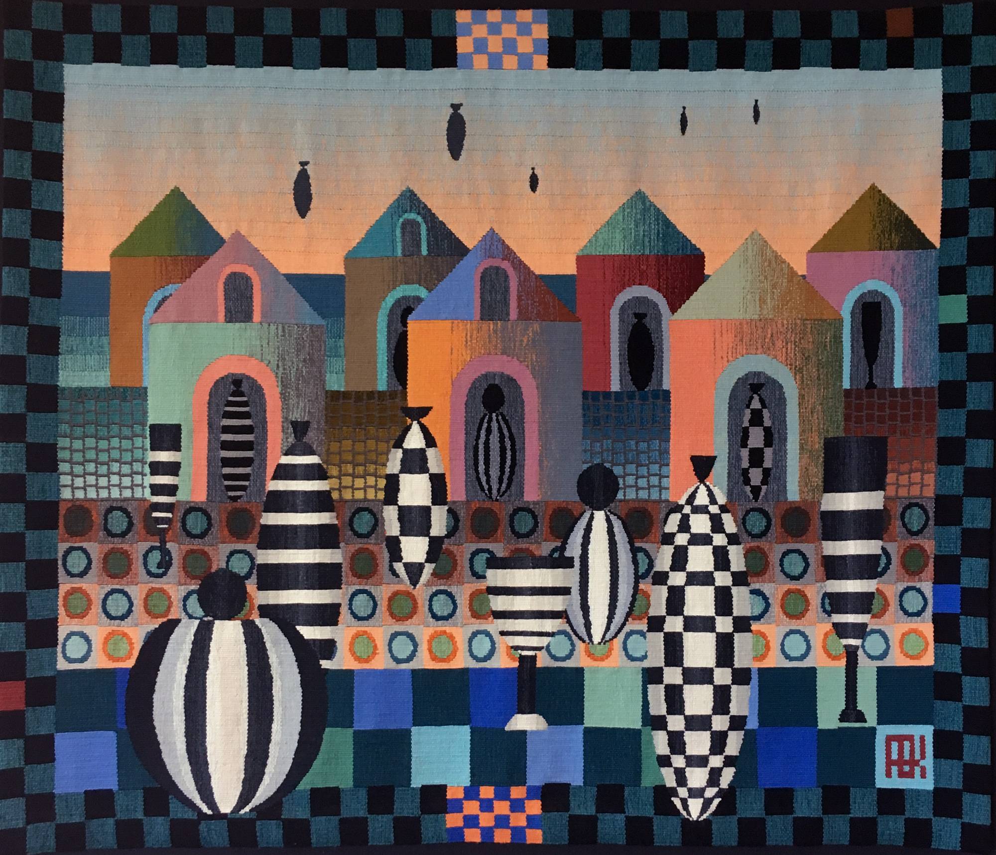 woven textile of houses and striped balloon like objects